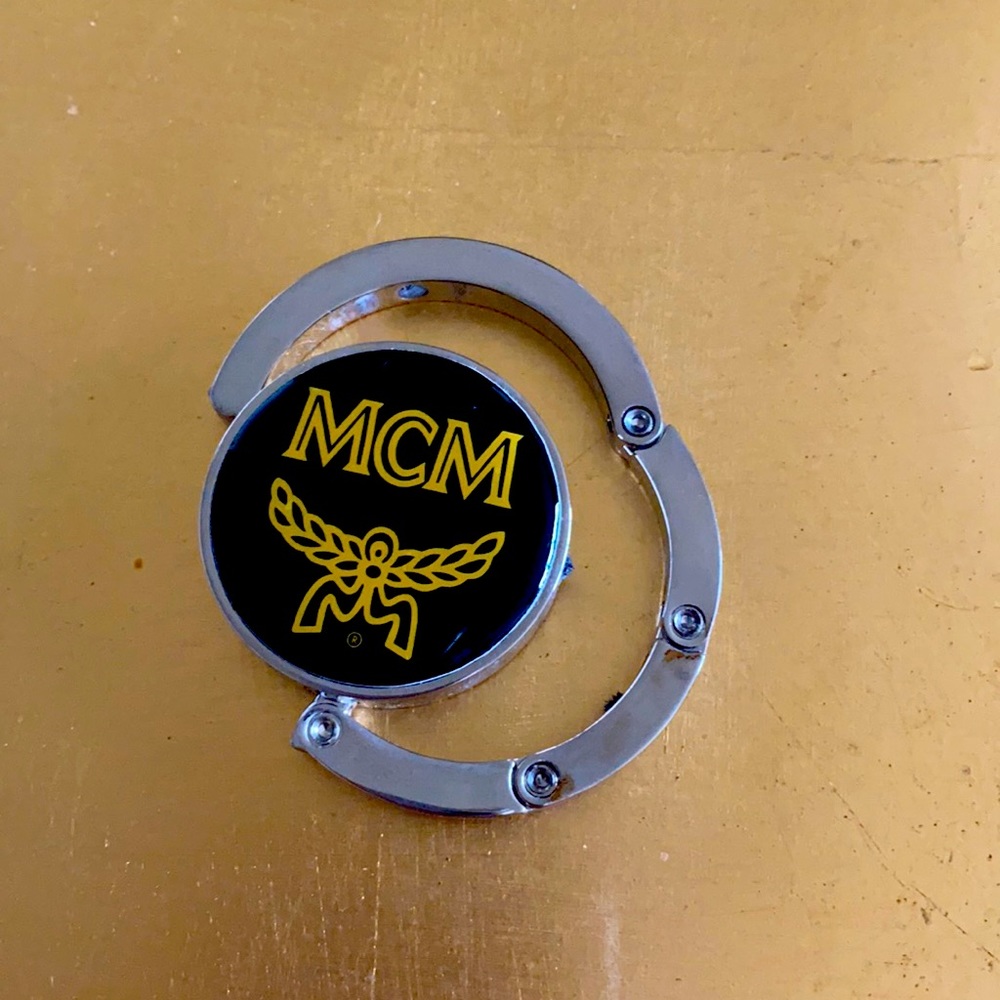 MCM Black and Gold Logo Purse Hook